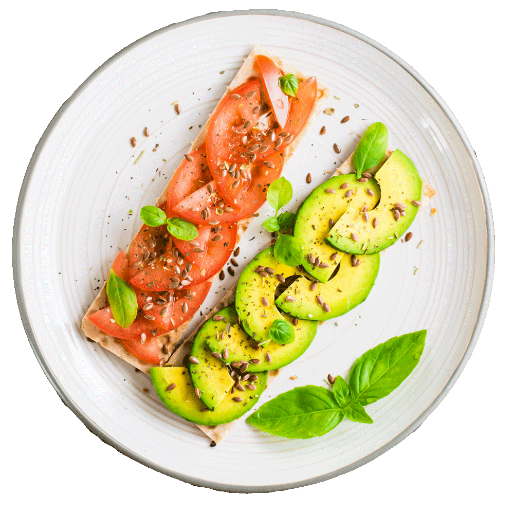 Tomato and avocado toast with basil.